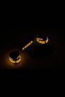 Dream Toys Radiant Handcuff Glow In The Dark Orange kézbilincs